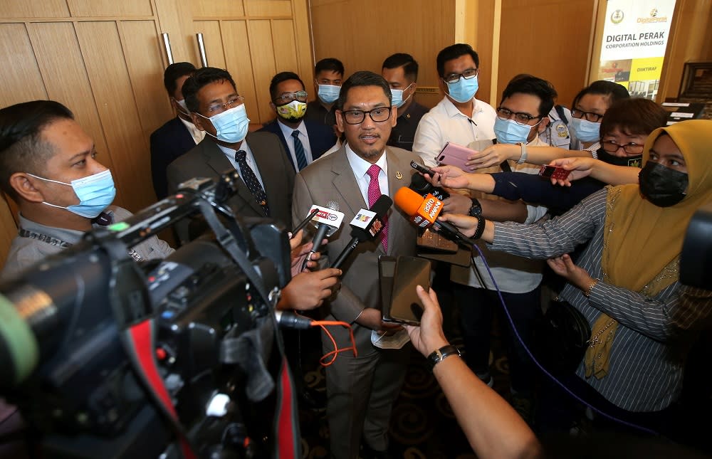 Datuk Seri Ahmad Faizal Azumu speaking to press at the Weil Hotel in Ipoh October 9, 2020. — Picture by Farhan Najib