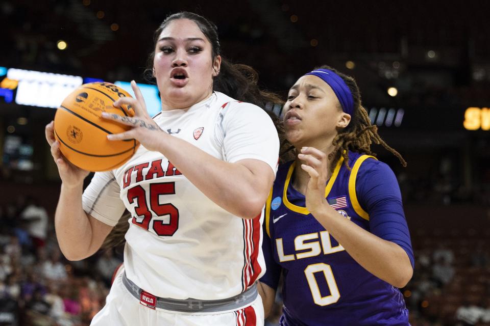 Utah’s Alissa Pili (35) fights for control of the basketball with LSU’s LaDazhia Williams during Sweet 16 in Greenville, S.C., Friday, March 24, 2023. | Mic Smith, Associated Press