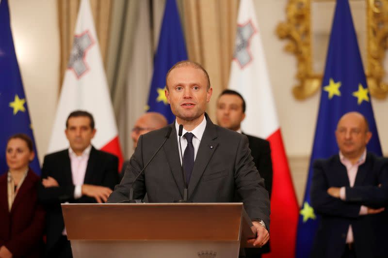 Maltese Prime Minister Joseph Muscat addresses a press conference after an urgent Cabinet meeting at the Auberge de Castille in Valletta