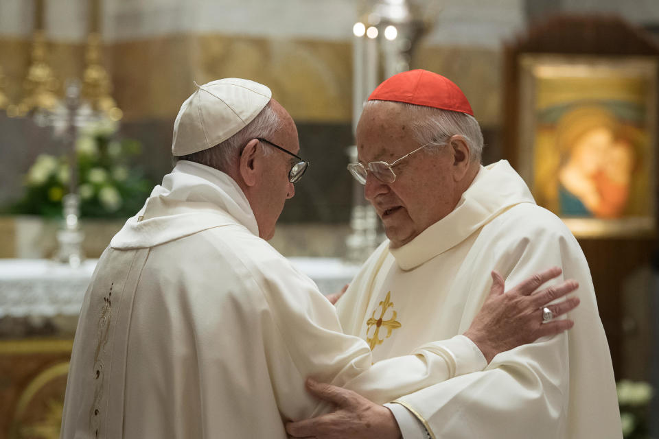 FILE - Pope Francis, left, greets Cardinal Angelo Sodano at the Vatican, Thursday, Dec. 7, 2017. Sodano, a once-powerful Italian prelate who long served as the Vatican's No. 2 official, has died on Friday, May 27, 2022. He was 94. (L'Osservatore Romano/Pool Photo via AP, File)