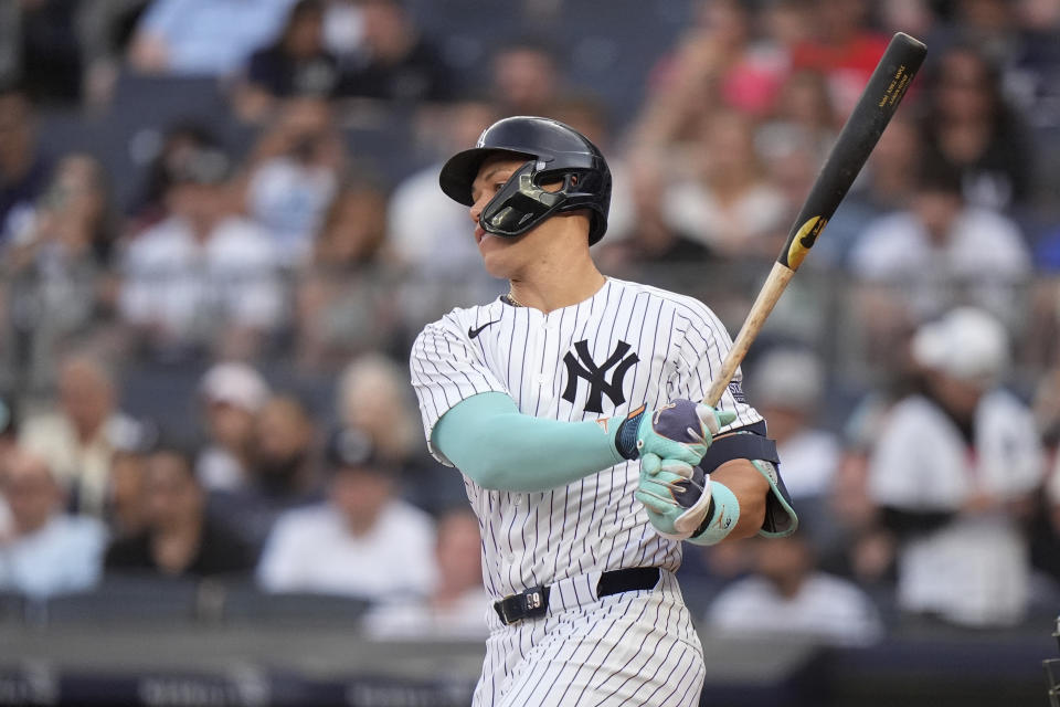 New York Yankees' Aaron Judge hits a single during the first inning of a baseball game against the Cincinnati Reds, Tuesday, July 2, 2024, in New York. (AP Photo/Frank Franklin II)