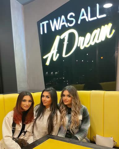 <p>Doniya Malik Instagram</p> Walihya, Safaa and Doniya Malik enjoying a dinner in October 2021.