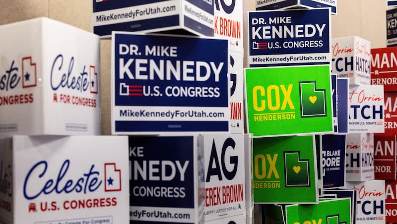Signs are pictured in the expo hall during the Utah Republican Party state nominating convention at the Salt Palace Convention Center in Salt Lake City on Saturday, April 27, 2024.