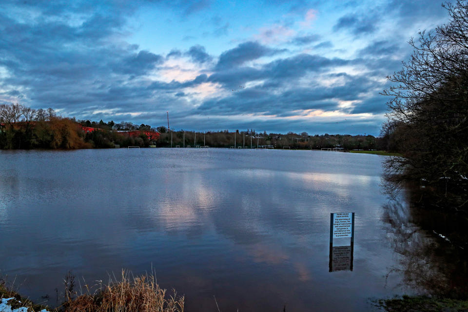 Playing fields at a school in Didsbury, Manchester, were left flooded after the River Mersey rose.