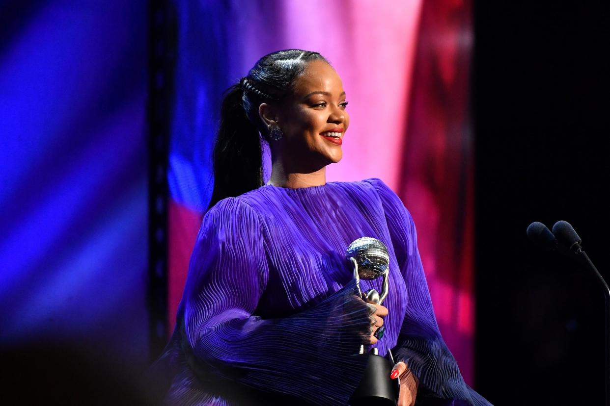 Rihanna accepts the Presidents Award onstage during the 51st NAACP Image Awards: Getty Images for BET