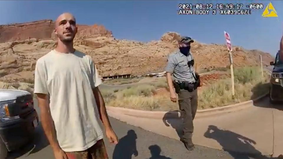 In this image taken from police body camera video provided by the Moab Police Department, Brian Laundrie talks to a police officer after police pulled over the van he was travelling in (MPD)