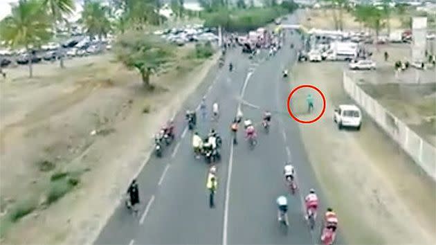 Footage shows the man dragging the barriers across the road. Pic: Twitter/@a_forestier