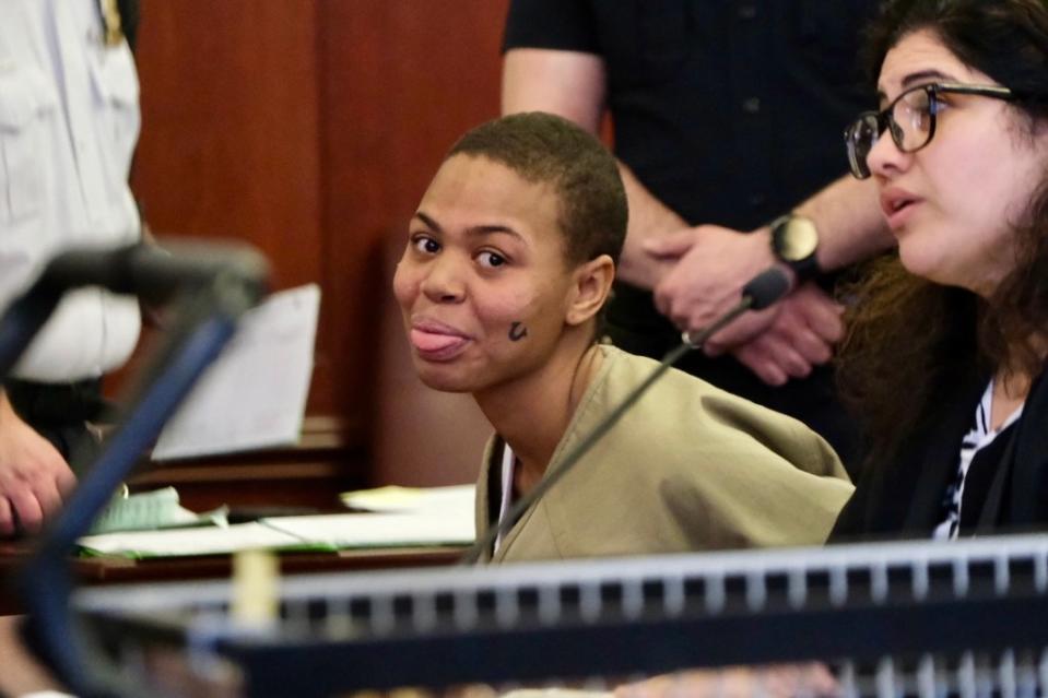 Amira Hunter, 23, was arraigned in Manhattan Supreme Court on assault charges for bashing cellist Iain S. Forrest in the head while he performed in the Herald Square subway station on Feb. 19. Gabriella Bass
