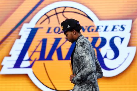Jun 23, 2016; New York, NY, USA; Brandon Ingram (Duke) walks off stage after being selected as the number two overall pick to the Los Angeles Lakers in the first round of the 2016 NBA Draft at Barclays Center. Mandatory Credit: Jerry Lai-USA TODAY Sports