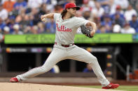 Philadelphia Phillies pitcher Aaron Nola throws during the first inning of a baseball game against the New York Mets, Tuesday, May 14, 2024, in New York. (AP Photo/Adam Hunger)