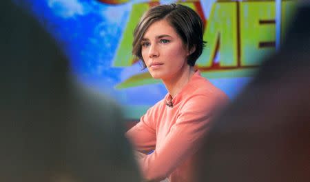 Amanda Knox reacts during her interview on ABC's "Good Morning America" in New York January 31, 2014. REUTERS/Andrew Kelly/Files