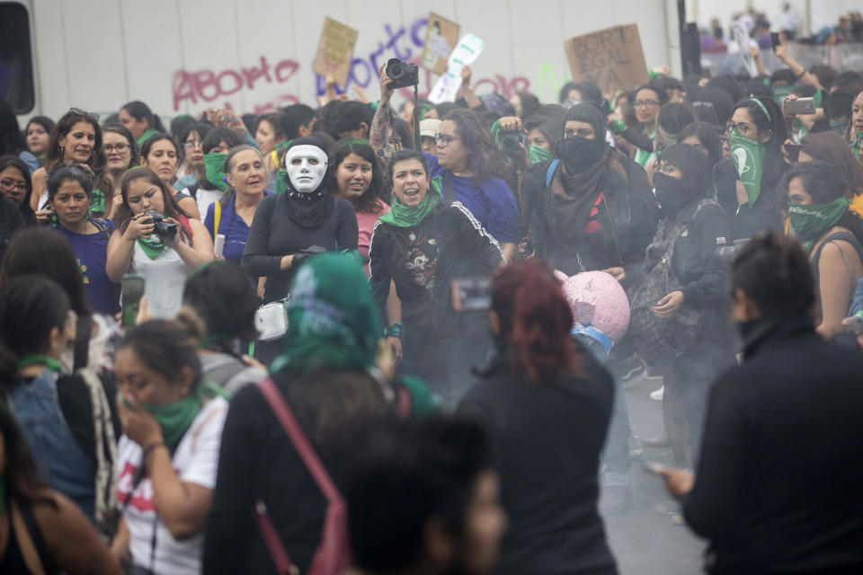 Women march for abortion rights in Mexico City, Saturday Sept. 28, 2019. Mexican women on Saturday marched on Saturday highlighting increased efforts across Latin America to lift some of the world's most restrictive abortion laws. (AP Photo/Anthony Vazquez)