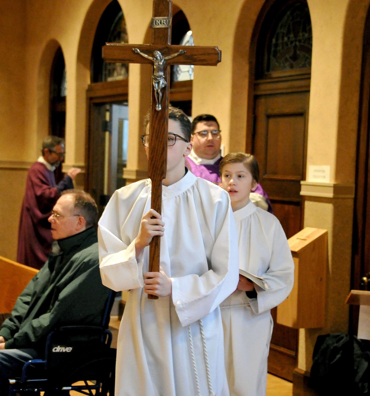 The Ash Wednesday morning service at the St. Mary of the Immaculate Conception Church in Wooster begins.