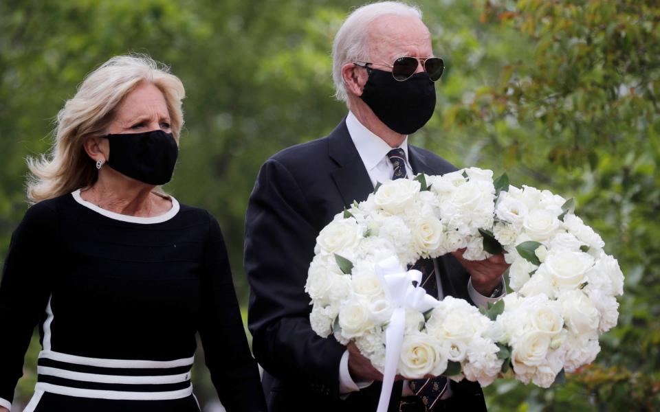 Democratic US presidential candidate and former Vice President Joe Biden and his wife Jill visit the War Memorial Plaza during Memorial Day - Reuters