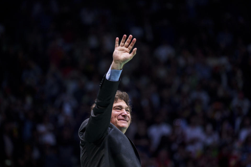 Argentina's president Javier Milei gestures as he delivers a speech on stage during the Spanish far-right wing party Vox's rally "Europa Viva 24" in Madrid, Spain, Sunday, May 19, 2024. VOX has invited speakers from across the right wing spectrum including Marine Le Pen, Viktor Orban and Argentine President Javier Milei who has been visiting Spain since Friday. (AP Photo/Manu Fernandez)