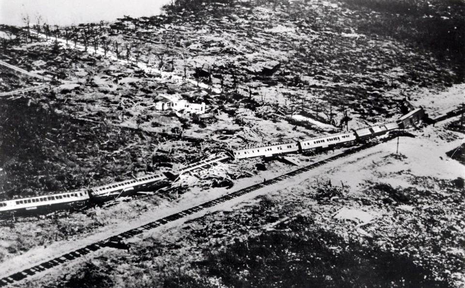 FILE - This September 1935 file photo shows the wreckage of a passenger train that was derailed by a Labor Day hurricane in the Florida Keys. The 1935 Labor Day Hurricane, which hit the Florida Keys, was the strongest hurricane to make landfall in the United States, based on barometric pressure. (AP Photo/File)
