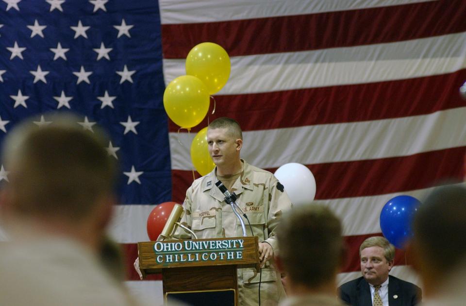 Capt. David Hoeffel, commander of the 1001st, talks Saturday, March 20, 2004, about the unit's duties while serving in the Middle Eaast.