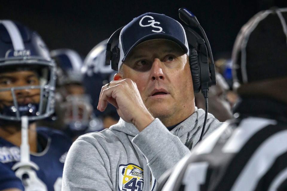 Georgia Southern head coach Clay Helton looks at a replay on a called fumble by the Eagles. The play was reversed as the runner was down by contact. Helton's Eagles need one more win to become bowl eligible. They play Appalachian State on Nov. 26 at Paulson Stadium.