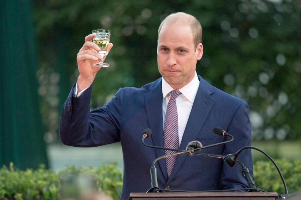 The duke raises a toast as he attends the Queen's Birthday Party at UK Ambassador's residence in Amman (PA)