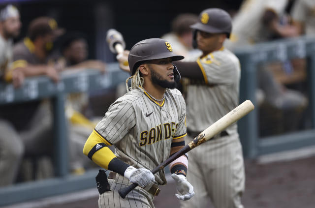 Colorado Rockies' Matt Kemp heads to home plate to score on a