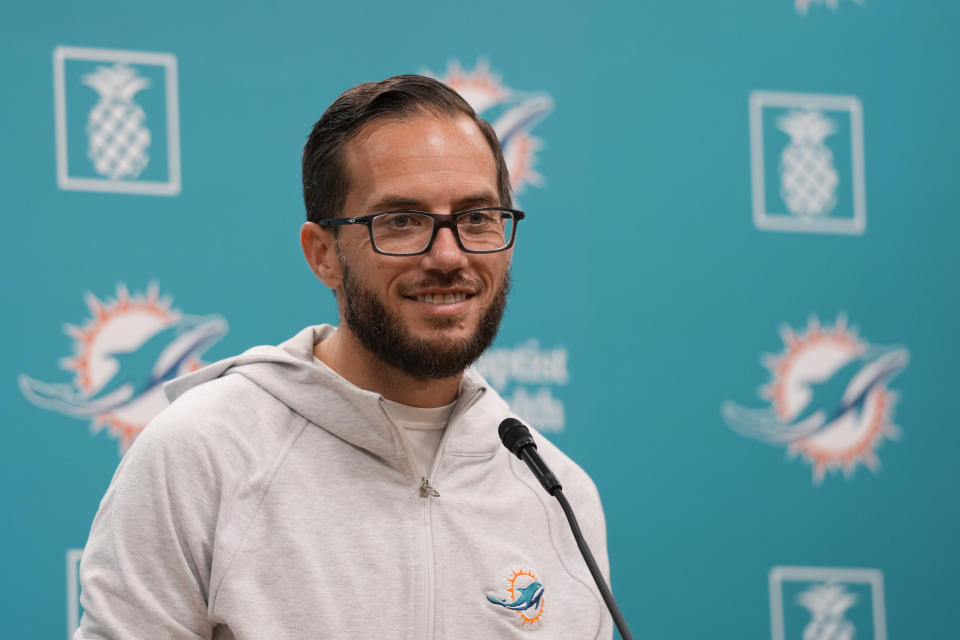 Miami Dolphins head coach Mike McDaniel smiles a he speaks to members of the media at the NFL football team's practice facility, Wednesday, Jan. 11, 2023, in Miami Gardens, Fla. The Dolphins will play the Buffalo Bills in a wild-card game on Sunday. (AP Photo/Wilfredo Lee)