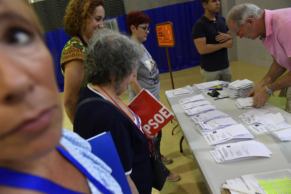 Election officials count ballots at a polling station in Pamplona, northern Spain, Sunday July 23, 2023. Voters in Spain went to the polls Sunday in an election that could make the country the latest European Union member to swing to the populist right, a shift that would represent a major upheaval after five years under a left-wing government.(AP Photo/Alvaro Barrientos)