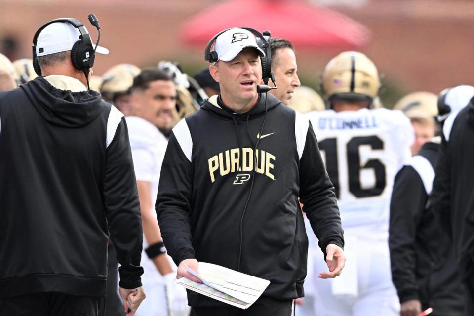 Purdue head coach Jeff Brohm watches from the sidelines during a game against Maryland on Oct. 8. Could Louisville lure him away from the Boilermakers?