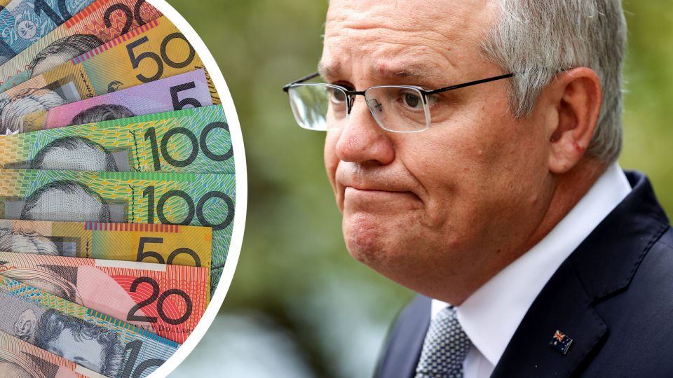 Australian currency fanned out and Prime Minister Scott Morrison.