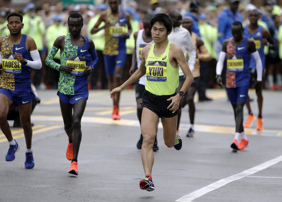Yuki Kawauchi, of Japan, winner of the 2018 Boston Marathon, warms up before the start of the 123rd Boston Marathon on Monday, April 15, 2019, in Hopkinton, Mass. (AP Photo/Steven Senne)