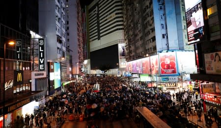 Anti-extradition bill protesters are seen on the street in front of Causeway Bay subway station, in Hong Kong
