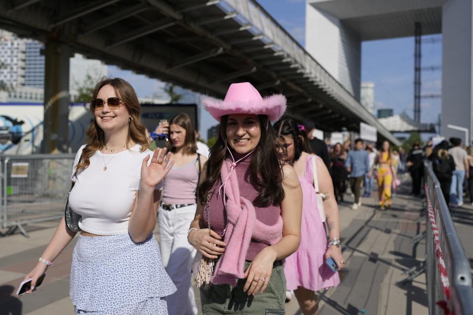 Fans arrive for the Taylor Swift concert at the Paris Le Defense Arena as a part of her Eras Tour concert in Paris, Thursday, May 9, 2024. (AP Photo/Lewis Joly)