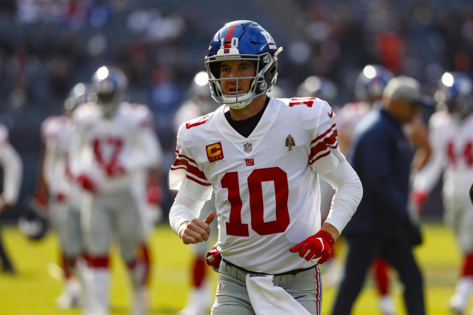 FILE - In this Nov. 24, 2019, file photo, New York Giants quarterback Eli Manning (10) is shown before an NFL football game against the Chicago Bears, in Chicago. Giants quarterback Daniel Jones was kept out of practice Wednesday, Dec. 4, 2019, with a high right ankle sprain, and coach Pat Shurmur says Eli Manning “very likely” will start Monday night against the Philadelphia Eagles. Shurmur adds that Manning could very well be the starter for the rest of the season. (AP Photo/Paul Sancya, File)