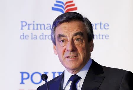 Francois Fillon, former French prime minister, speaks at the offices of the high authority of the committee organising the Les Republicains party vote after the results in the second round for the French center-right presidential primary election in Paris, France, November 27, 2016. REUTERS/Gonzalo Fuentes