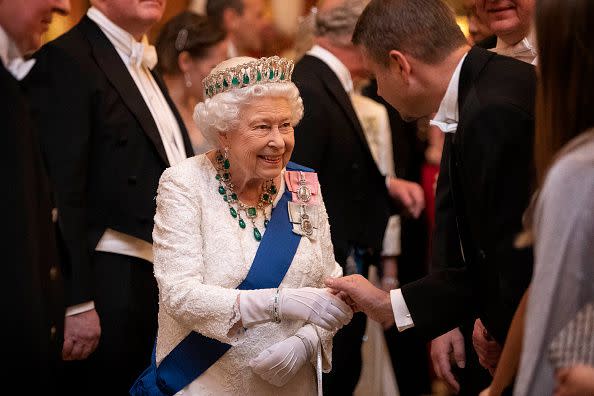 2019: Queen Elizabeth II talks to guests at an evening reception for members of the Diplomatic Corps at Buckingham Palace on December 11, 2019, in London.