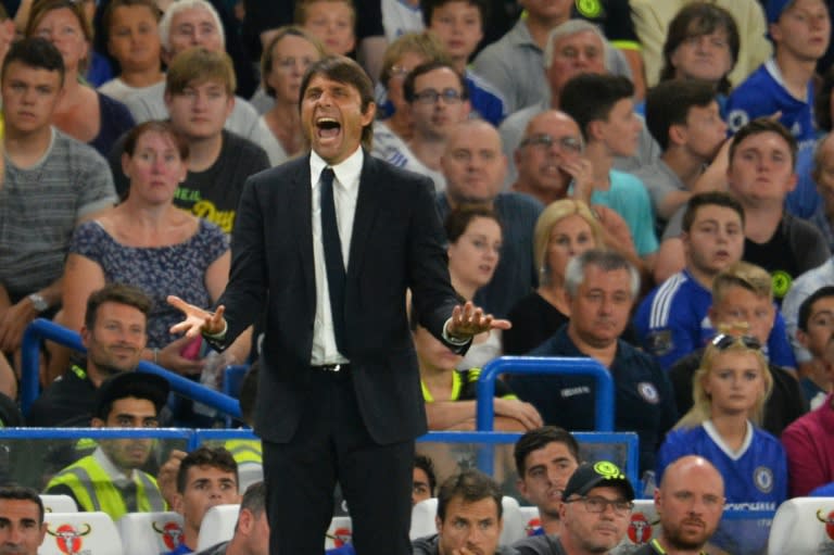 Chelsea's Italian head coach Antonio Conte gestures from the touchline during the match against Bristol Rovers at Stamford Bridge in London on August 23, 2016