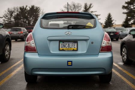 A license plate hinting at the owner's political affiliation is spotted at South Hills Village in Bethel Park, Pennsylvania, U.S. February 15, 2018. Picture taken February 15, 2018. REUTERS/Maranie Staab