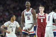 UConn forward Samson Johnson celebrates a basket during the second half of the NCAA college basketball game against Alabama at the Final Four, Saturday, April 6, 2024, in Glendale, Ariz. (AP Photo/Brynn Anderson )