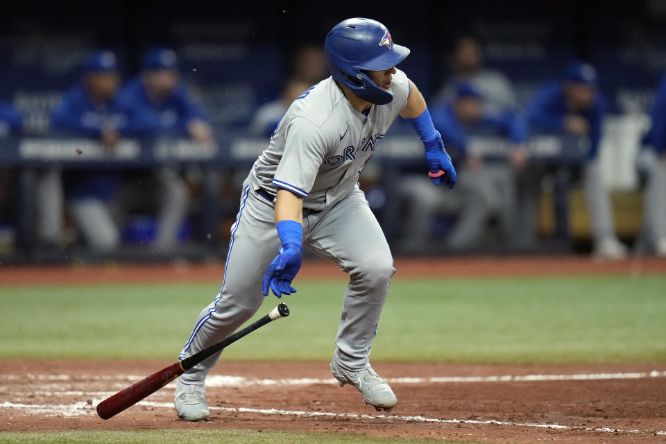 Toronto Blue Jays' Daulton Varsho watches his RBI single off Tampa Bay Rays relief pitcher Kevin Kelly during the sixth inning of a baseball game Friday, Sept. 22, 2023, in St. Petersburg, Fla. (AP Photo/Chris O'Meara)