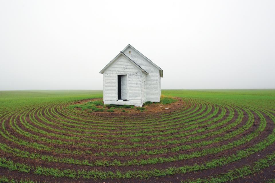 This photo provided by Terry Hinnenkamp shows an abandoned one-room school house in Clear Lake Township in Kidder County, N.D., featured in the book "Ghosts of North Dakota Volume 2." (AP Photo/Terry Hinnenkamp)