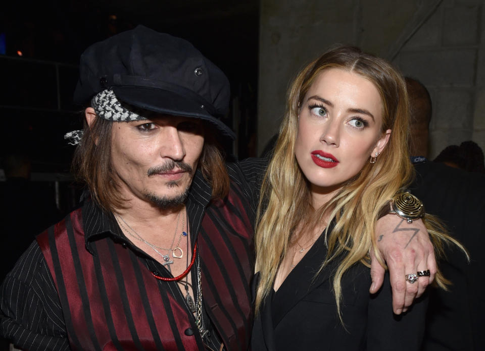 Johnny Depp and Amber Heard attend at the Grammy Awards in 2016. (John Shearer via Getty Images)