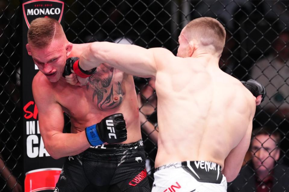 LAS VEGAS, NEVADA – MARCH 02: (R-L) Ludovit Klein of Slovakia punches AJ Cunningham in a lightweight bout during the UFC Fight Night event at UFC APEX on March 02, 2024 in Las Vegas, Nevada. (Photo by Jeff Bottari/Zuffa LLC via Getty Images)