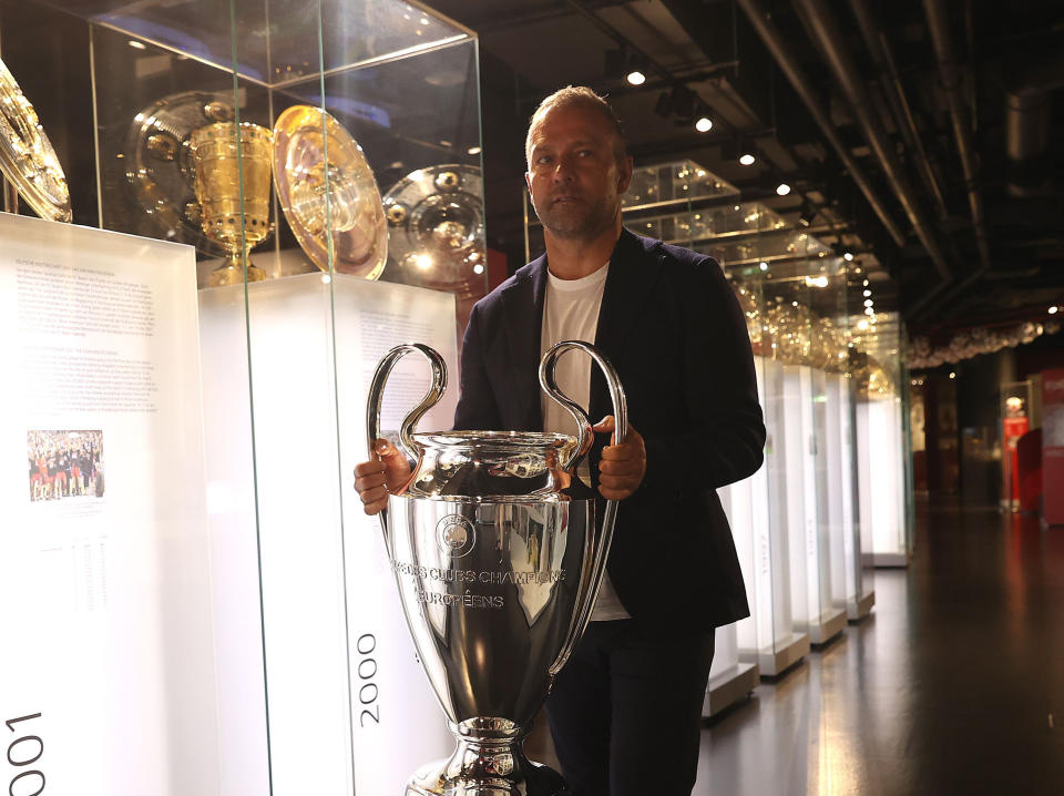 Bayern coach Hansi Flick with the Champions League trophyGetty Images