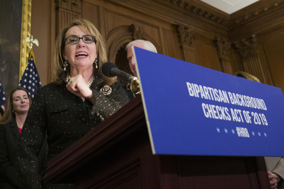 FILE - In this Jan. 8, 2019, file photo, former Rep. Gabby Giffords, speaks during a news conference to announce the introduction of bipartisan legislation to expand background checks for sales and transfers of firearms, on Capitol Hill in Washington. Two prominent gun safety organizations say they'll host a forum for Democratic presidential candidates in Las Vegas on Oct. 2, the day after the second anniversary of the deadliest mass shooting in modern U.S. history. March For Our Lives and the Giffords group told The Associated Press that the forum is the first of its kind for presidential hopefuls. (AP Photo/Alex Brandon, File)