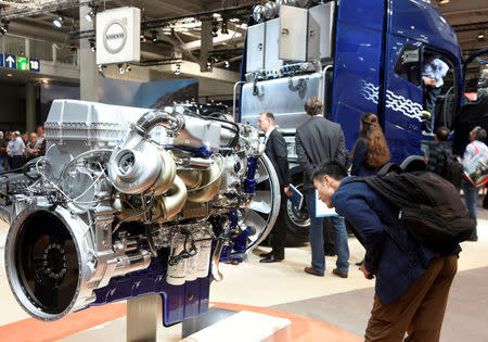 FILE PHOTO: A visitors looks at a Volvo D16 engine at the booth of Swedish truck maker Volvo at the IAA truck show in Hanover, September 22, 2016. REUTERS/Fabian Bimmer/File Photo