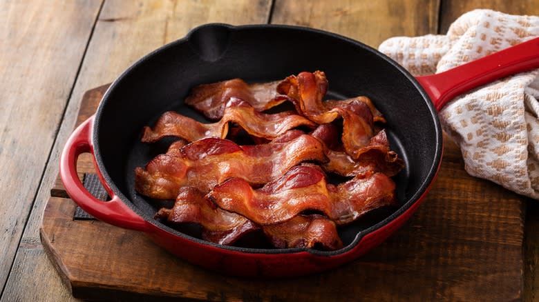 Pan with bacon on counter