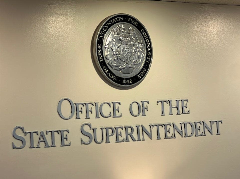 The Maryland State Seal on the wall of the Office of the State Superintendent in Baltimore, Maryland. The Latin legend on the seal's border is the from Psalm 5:12 from the Latin Vulgate Bible, which translates as "with favor wilt thou compass us as with a shield."