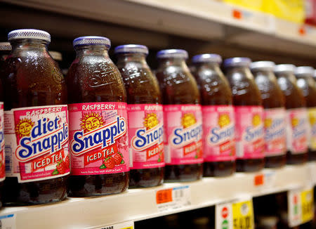 FILE PHOTO: Snapple bottles are seen inside a store in Port Washington, New York May 7, 2008. REUTERS/Shannon Stapleton/File Photo