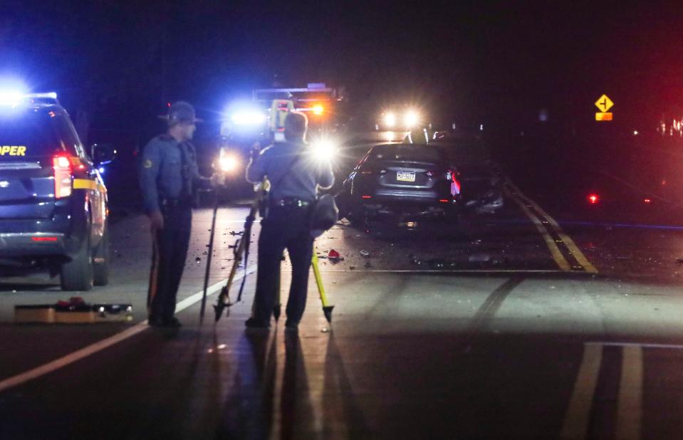 Delaware State Police investigate after a motor vehicle accident left two people dead on Wrangle Hill Road near Mabel Lane shortly after 10 p.m. Wednesday, April 10, 2024.