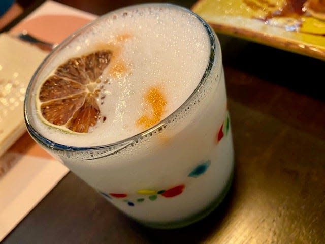 The Pisco Sour is Peru’s national drink, shown here at Tallahassee's Cafe de Martin.