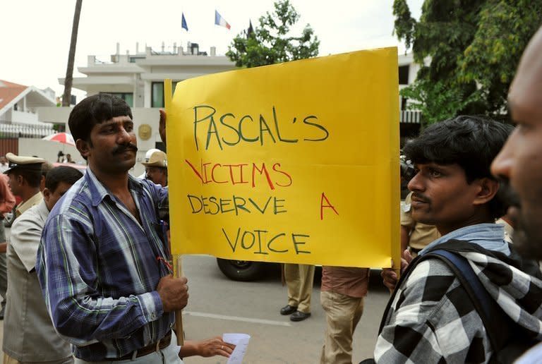 Indian activists from 'Campaign Against Child Labour' shout slogans during a protest rally outside the French consulate in Bangalore, on June 18, 2012. The Indian wife of a French consular official charged with raping their daughter has demanded a meeting with Francois Hollande, presenting the French president with a thorny diplomatic dilemma on his first state visit to India